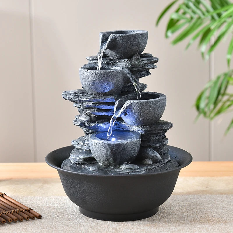 Fuente de mesa eléctrica interior con luces LED - diseño decorativo de rocas escalonadas y cascada - sonido de agua tranquilo y relajante