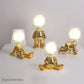 Nordic Golden Man Table Lamp Lâmpada da sala do quarto de cabeceira do quarto infantil Luzes noturnas Rede de lâmpadas criativas de mesa criativa Decoração iluminação